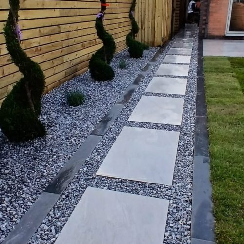 A picture of a porcelain paving path done by Wise Roots