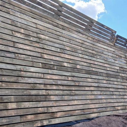 A picture of some horizontal commercial fencing done by Wise Roots